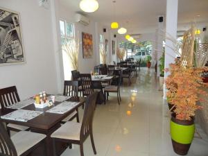 En restaurant eller et andet spisested på Tulip Boutique Hotel