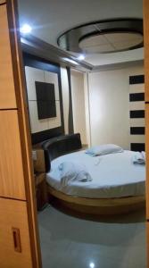 Postel nebo postele na pokoji v ubytování Bermuda Hotel