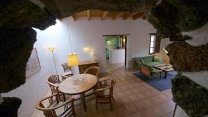 Un lugar para sentarse en Großes Ferienhaus in Guatiza mit Gemeinsamem Pool