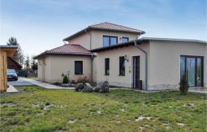 a house in a yard with at Awesome Apartment In Harzgerode in Harzgerode