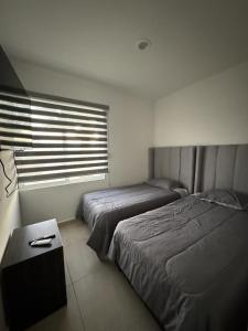 Postel nebo postele na pokoji v ubytování Almarena Paradise + 11 fotografií