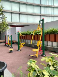 a group of playground equipment in a building at Delipark Mall 3 Bedrooms 3 Bathrooms 8-10 Pax Empire Premium Tower Level 28 in Medan