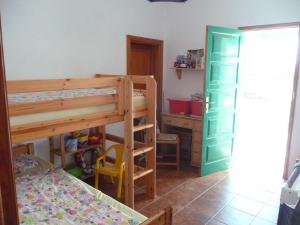 Łóżko lub łóżka w pokoju w obiekcie Finca mit Pool und herrlichem Meerblick