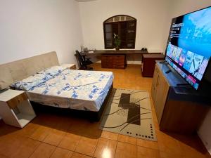 Fotografija v galeriji nastanitve Alugo quarto com WC privativo v mestu Sao Paulo