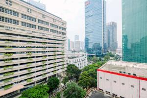 an aerial view of a city with tall buildings at Luxury 3BR Apartment at Sudirman Tower Condominium By Travelio in Jakarta