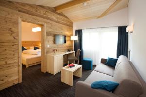 Postel nebo postele na pokoji v ubytování Boutique-Hotel Vincenz