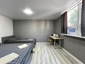 Ένα ή περισσότερα κρεβάτια σε δωμάτιο στο Apartments in Center