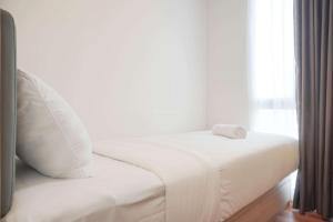 Galeriebild der Unterkunft Cozy Living 2BR at Tokyo Riverside PIK 2 Apartment By Travelio in Rawalembang