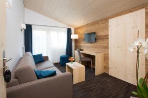 TV a/nebo společenská místnost v ubytování Boutique-Hotel Vincenz