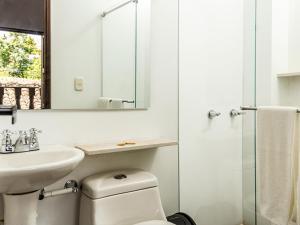 Koupelna v ubytování Hotel Casa Suite Curiti