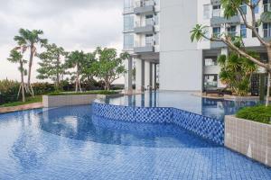 Kolam renang di atau dekat dengan Simple and Modern Studio (No Kitchen) Anderson Supermall Mansion Apartment By Travelio