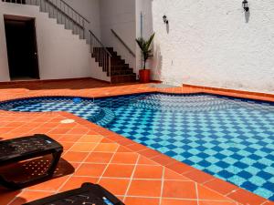 Bazén v ubytování Hotel Casa Suite Curiti nebo v jeho okolí