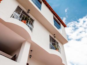 Balkón nebo terasa v ubytování Hotel Casa Suite Curiti