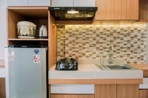 Kuchyň nebo kuchyňský kout v ubytování Restful and Enjoy Living Studio Parkland Avenue Apartment By Travelio