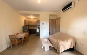 A kitchen or kitchenette at Nice Apartment In Nafpaktos With Wifi