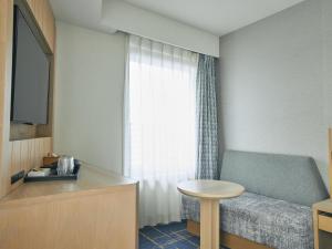 TV a/nebo společenská místnost v ubytování Hotel Traveltine Kyoto Kiyamachi