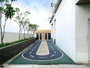 Fotografie z fotogalerie ubytování Cozy Living Studio at Vasanta Innopark Apartment By Travelio v destinaci Cikarang