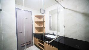 a bathroom with a sink and a mirror at Best Location and Strategic 2BR at Praxis Apartment By Travelio in Surabaya +32 photos