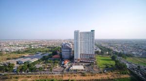 an overhead view of a tall building in a city at Tidy and Comfy Studio at Bale Hinggil Apartment By Travelio in Medokanayu