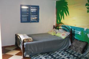 Postelja oz. postelje v sobi nastanitve Laverie du Soleil Surf House