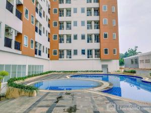 Πισίνα στο ή κοντά στο Modern and Nice Studio Apartment at Urban Heights Residences By Travelio