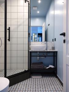 Koupelna v ubytování MIRO Rooms Center - quiet chic, self check-in