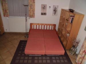 Ένα ή περισσότερα κρεβάτια σε δωμάτιο στο Ferienwohnung mit Terrasse, Garten und Grill