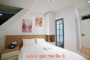 Voodi või voodid majutusasutuse L'amie Hotel & Studio toas
