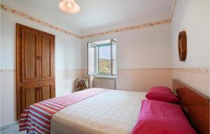Ένα ή περισσότερα κρεβάτια σε δωμάτιο στο Casa Della Nonna