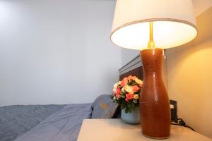 Postel nebo postele na pokoji v ubytování Sophia Apartment - Sophia Center Phu Cuong