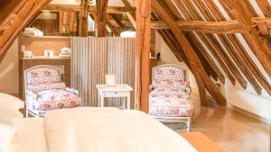 Posezení v ubytování Le Champ des Oiseaux Hôtel & Spa