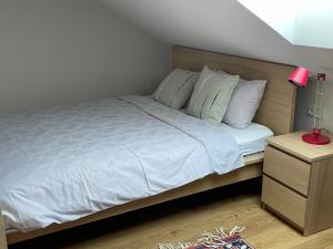 Posteľ alebo postele v izbe v ubytovaní Apartmán na úpatí Šumavy