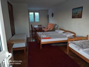 Postel nebo postele na pokoji v ubytování Anika apart