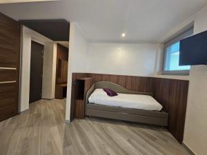 Voodi või voodid majutusasutuse Mito Hotel toas