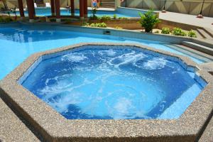 Bazén v ubytování Playa Almendro Resort nebo v jeho okolí