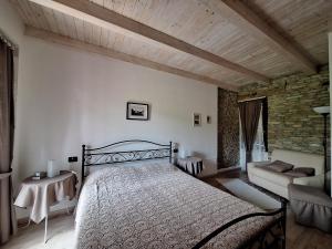 Postel nebo postele na pokoji v ubytování Agriturismo Cà Trinche