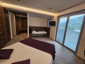 Voodi või voodid majutusasutuse Mito Hotel toas