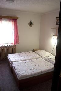 Postel nebo postele na pokoji v ubytování Hotel-Penzion Johanka