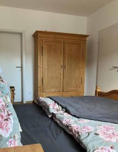 Postel nebo postele na pokoji v ubytování Ferien im Kühbergstadl