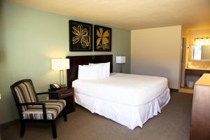 Postel nebo postele na pokoji v ubytování Unique Suites Hotel