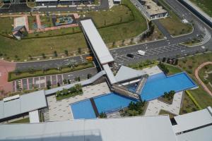 a model of a building with a swimming pool at Cove d'Adelia in Kajang