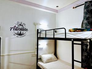 Voodi või voodid majutusasutuse The Bunkyard Hostel toas