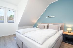 Ένα ή περισσότερα κρεβάτια σε δωμάτιο στο Sunseeker House No 1