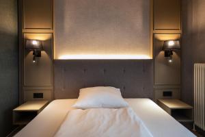 Postel nebo postele na pokoji v ubytování Roomingtons Karoli Waldkirchen