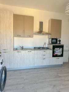 Kuchyň nebo kuchyňský kout v ubytování Il Punto Giusto