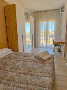 Postel nebo postele na pokoji v ubytování Il Punto Giusto + 9 fotografií