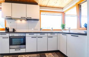 Kuchyň nebo kuchyňský kout v ubytování Ferienwohnung Sonntag