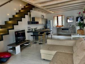 Posezení v ubytování Live la Dolce Vita! Your Lake Garda deluxe getaway