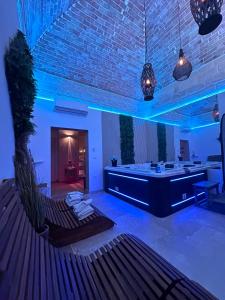 TV a/nebo společenská místnost v ubytování Rubino Suite & Spa