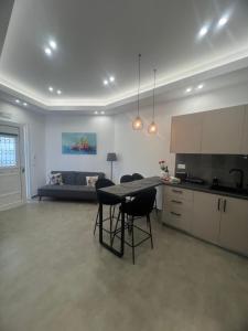 Kuchyň nebo kuchyňský kout v ubytování Stampalia Luxury Studios